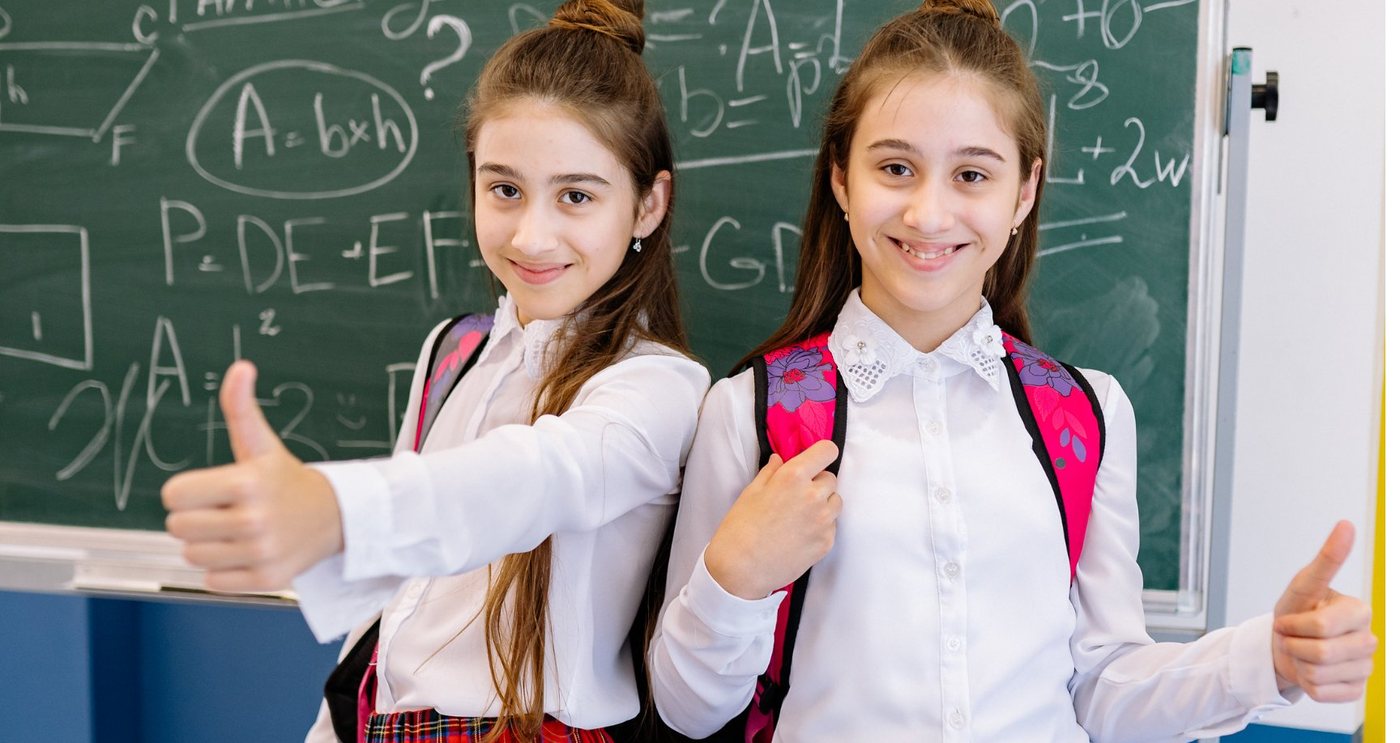 Students at a classroom blackboard